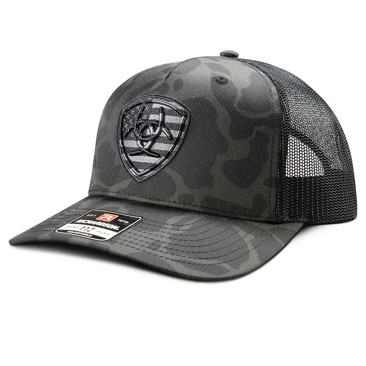 Ariat black camo embroidered shield trucker cap featuring mesh back and curved brim, casual headwear for outdoor activities.