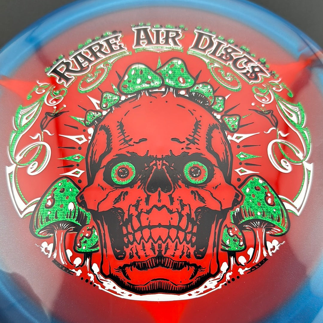 Rare Air Discs Halo S-Blend Conqueror disc golf disc featuring colorful design and bold branding on a white background.