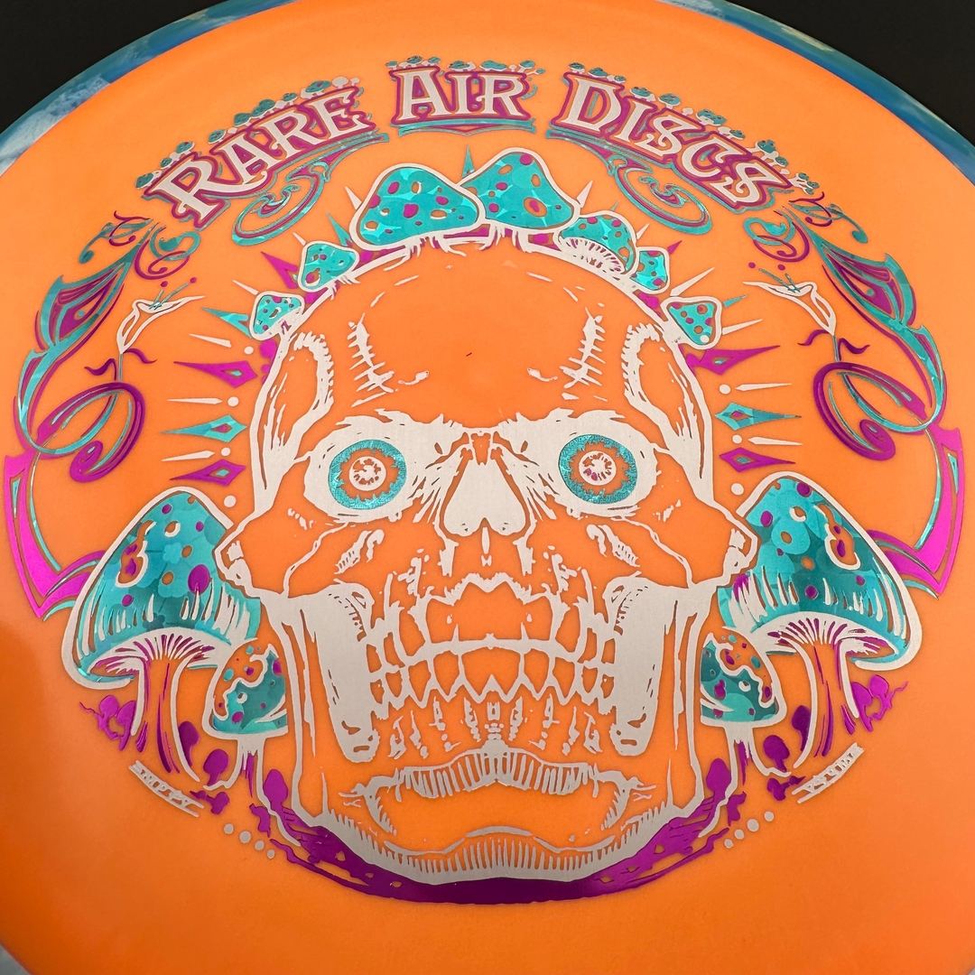 Fission Defy Crushin' Amanitas VIP 2.0 disc golf disc by Rare Air Discs, featuring vibrant artwork and detailed design.