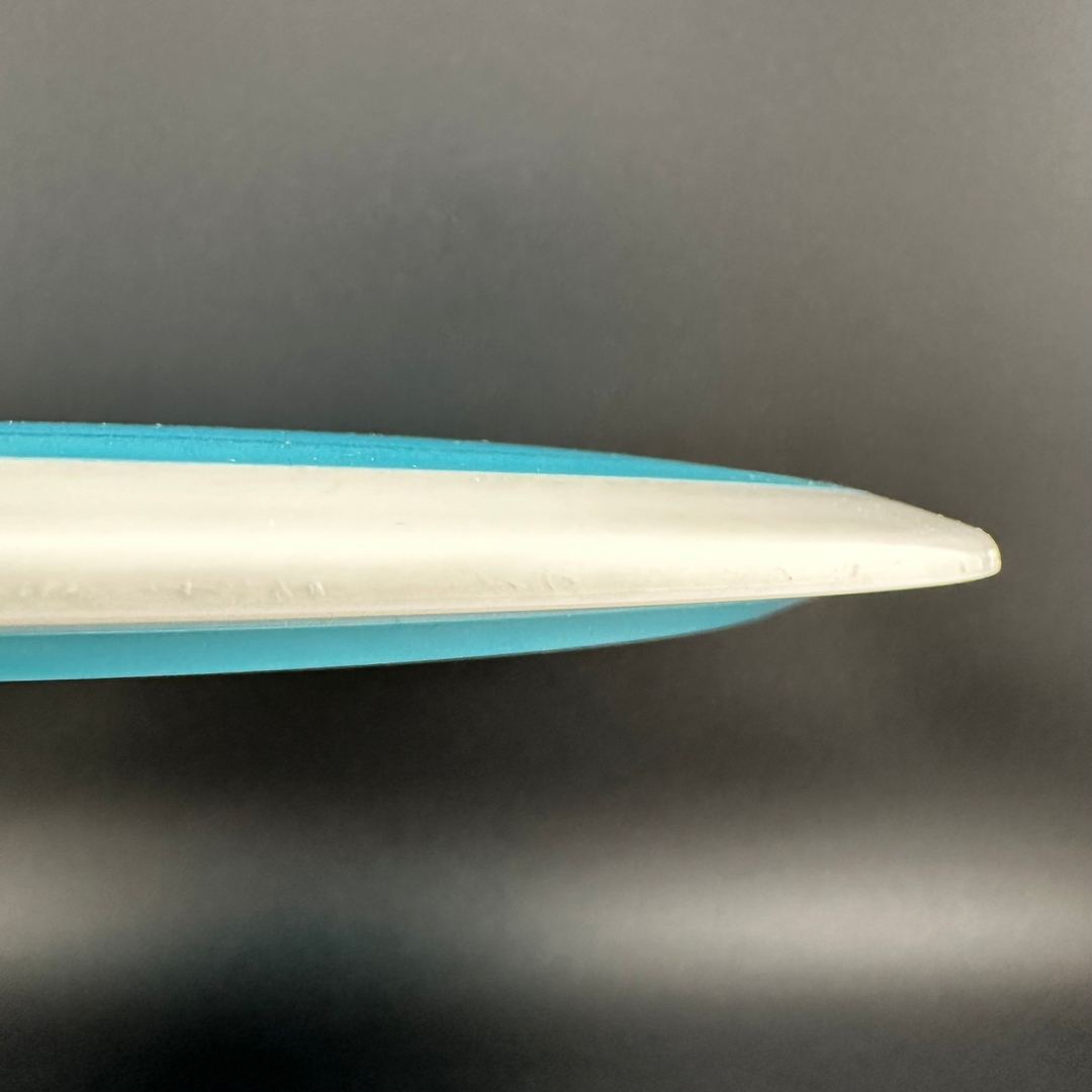 Fission Defy Crushin' Amanitas VIP 2.0 disc golf disc by Rare Air Discs, featuring vibrant design and aerodynamic shape.