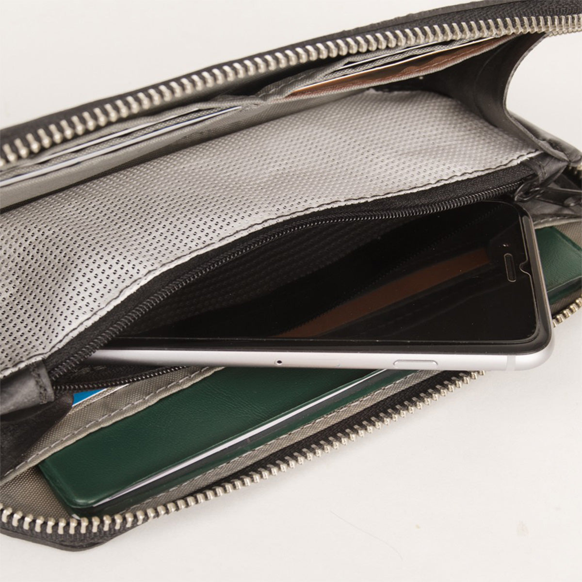 Gray Alchemy Goods Fauntleroy Clutch wallet by ZEITBIKE, featuring a compact zip design with leather details.