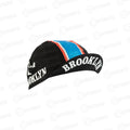 Black vintage cycling cap by ZEITBIKE featuring Brooklyn branding, shown from the side with detailed fabric texture.