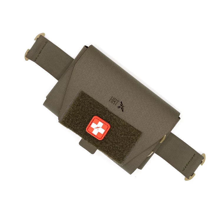 HCC Tactical ARC Medical Pouch in rugged green, showcasing compartments and durable fabric for tactical gear use.