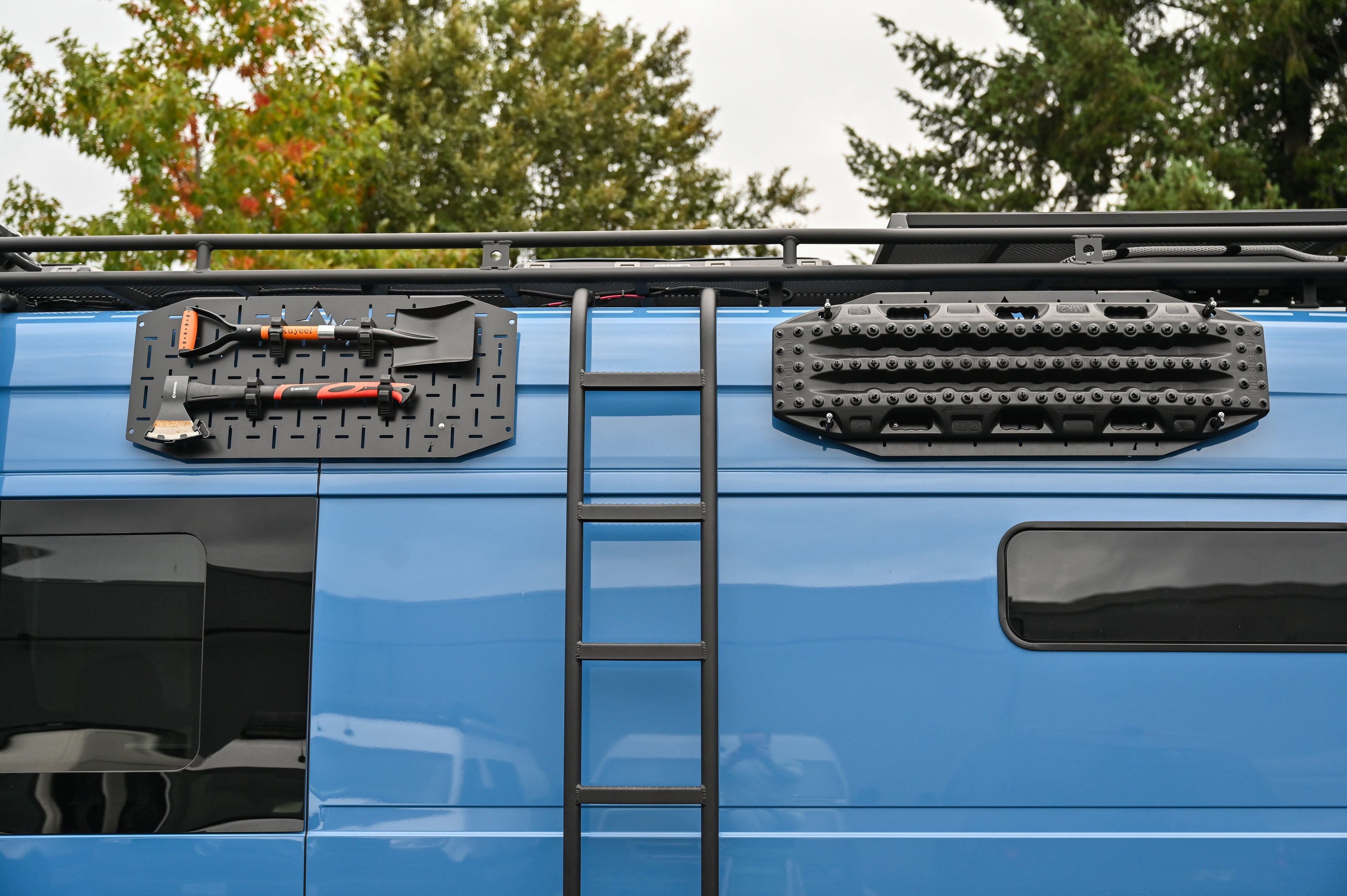 Alpine Van Works Alpaca Cargo Plate for Sprinter van exterior component with rugged aluminum finish and mounting hardware.