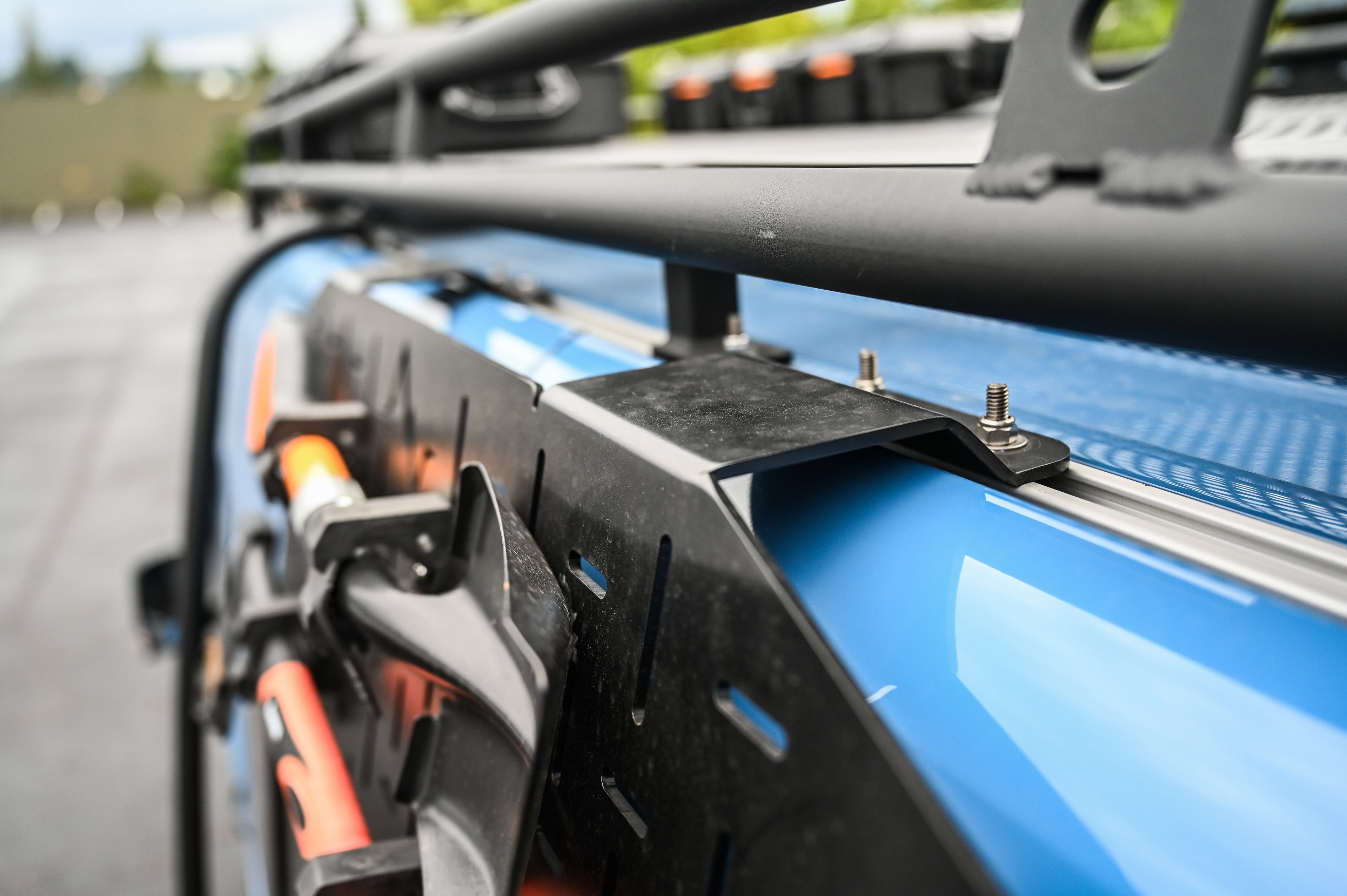 Alpine Van Works Alpaca Cargo Plate™️ exterior component for Sprinter vans, showcasing durable metal construction and mounting features.