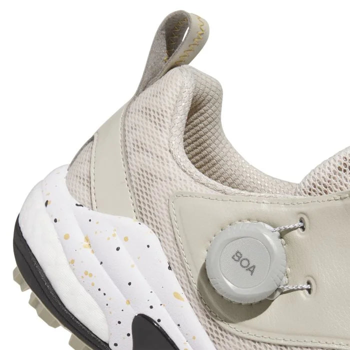 Adidas Codechaos BOA 25 golf shoes in white with black accents, featuring lace-up and BOA dial closure for a secure fit.