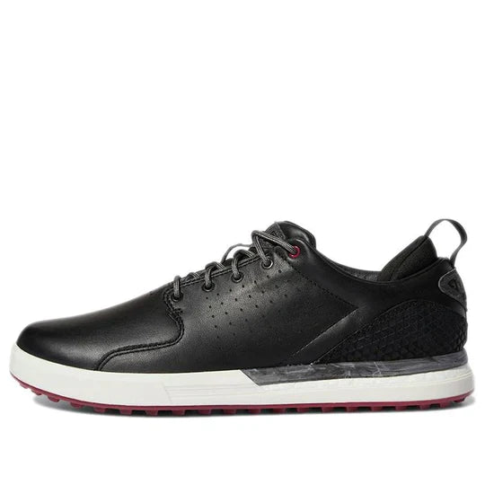 Adidas FLOPSHOT spikeless golf shoes in black with white accents, designed for comfort and grip on the golf course.