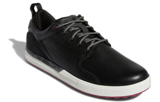 Adidas FLOPSHOT spikeless golf shoes by ParWestGolf, showing black and white athletic shoes with comfortable design and grip.