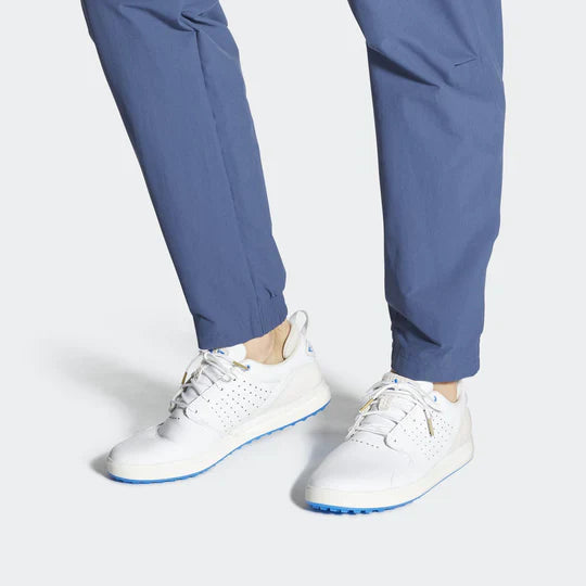 Adidas FLOPSHOT spikeless golf shoes with white and black design, featuring comfortable athletic footwear for golf.