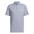 Adidas GO-TO Novelty Golf Polo Shirt in breathable fabric, featuring classic design and brand logo, worn by a golfer.