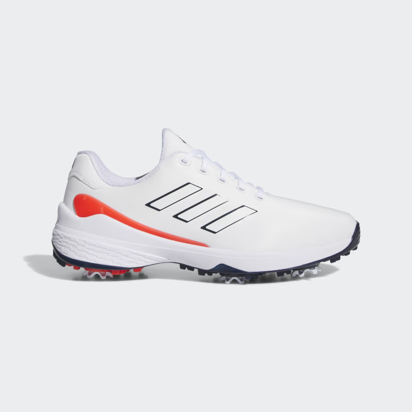 Black Adidas men's ZG23 golf shoes with white accents, featuring breathable mesh and durable soles for outdoor golf play.