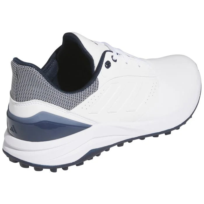 Adidas Solarmotion Spikeless 24 golf shoes in black with white accents, featuring a breathable upper and secure fit for golf.
