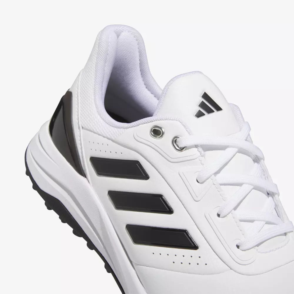 Adidas Solarmotion Spikeless 24 golf shoes in black with white accents, featuring a breathable upper and durable sole.