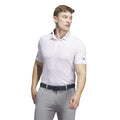 Adidas Ultimate365 allover print golf polo shirt in vibrant colors, designed for comfort and style on the golf course.
