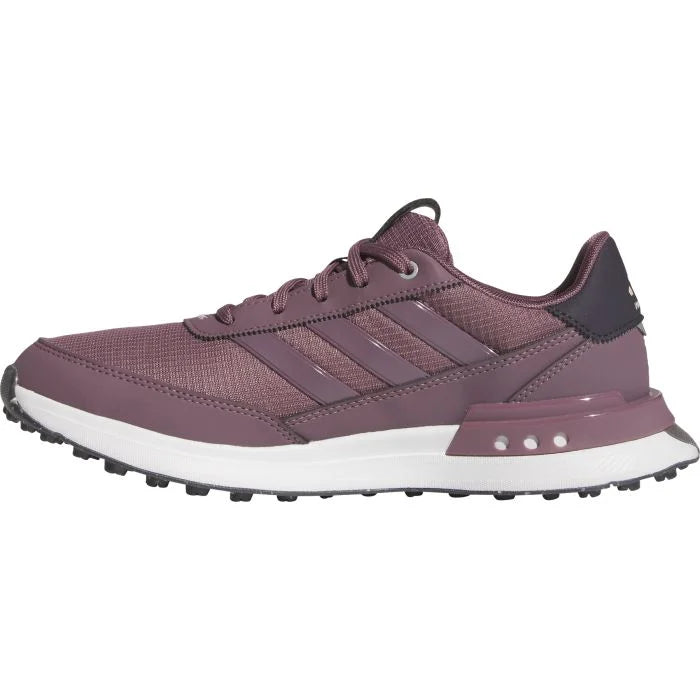 Adidas women's S2G Spikeless 24 golf shoes in white with black accents, lightweight and comfortable for on-course play.