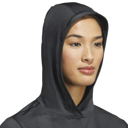 Adidas women's Ultimate365 printed hoodie in black with colorful graphic design, casual athletic clothing for women.