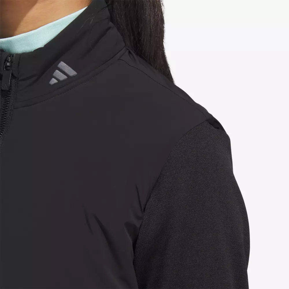 Adidas women's Ultimate365 Tour Frostguard full zip golf jacket with waterproof material and sporty design.