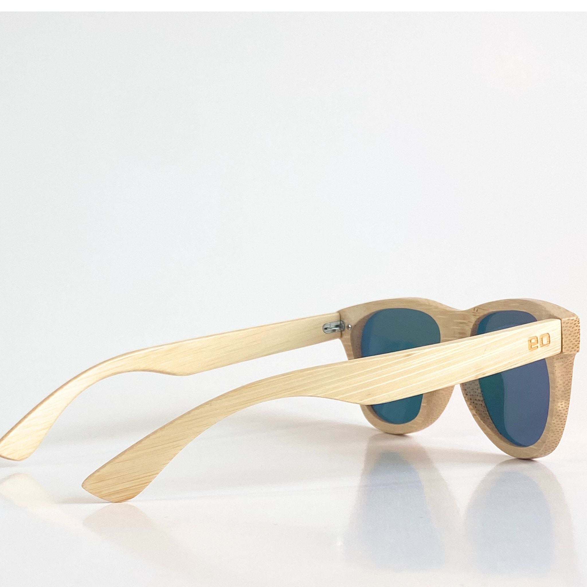 Back view of Eastern Outer Alejandra bamboo sunglasses showing the sleek frame and natural bamboo arms.