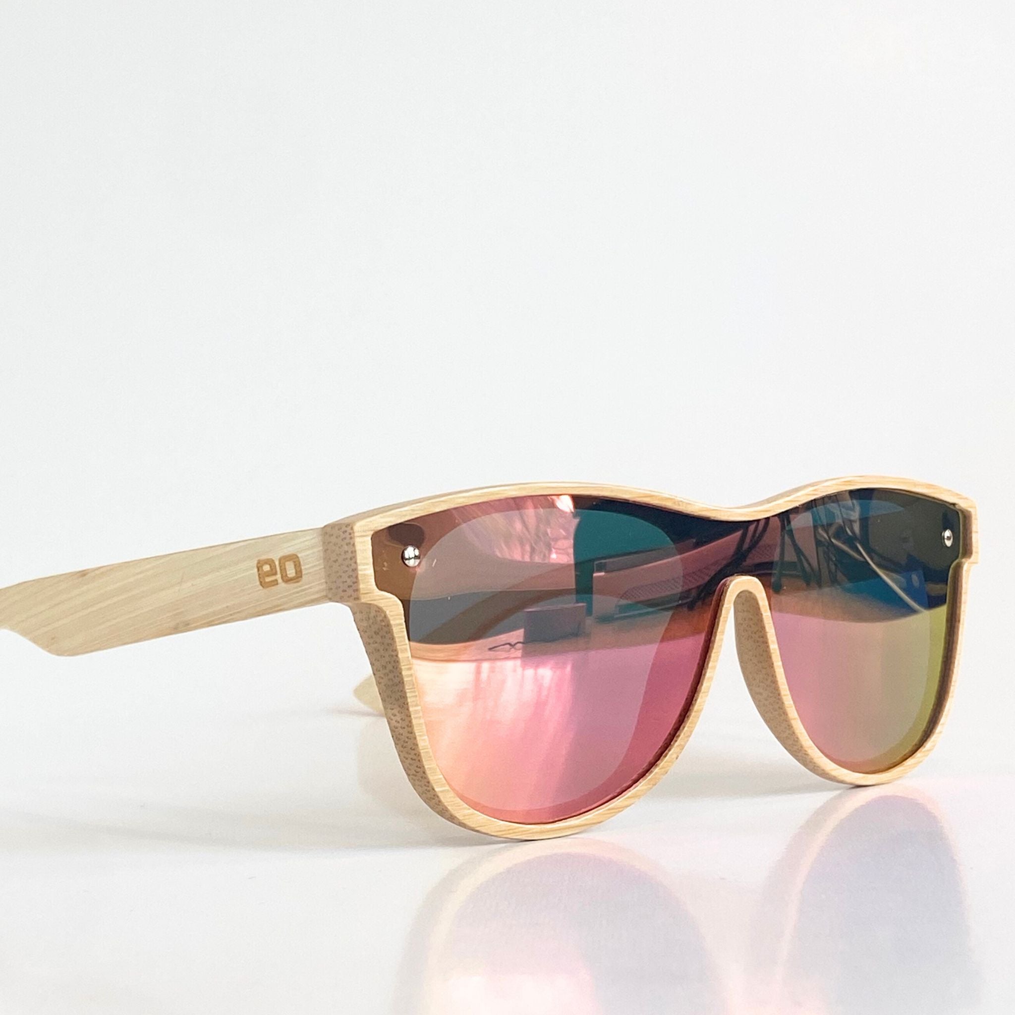Eastern Outer Alejandra sunglasses in natural bamboo with round frames, showcasing a stylish and eco-friendly eyewear design.