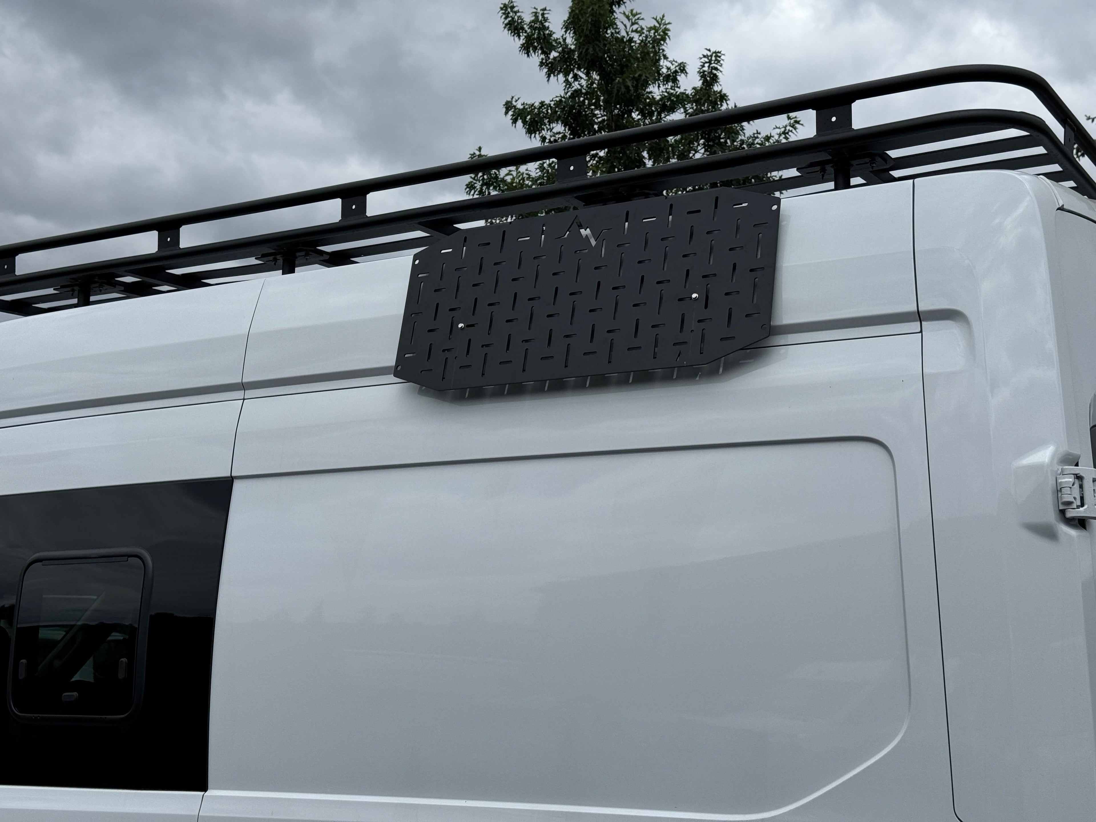 Alpine Van Works Alpaca Cargo Plate for Transit van exterior component, durable aluminum cargo mounting plate with rugged finish