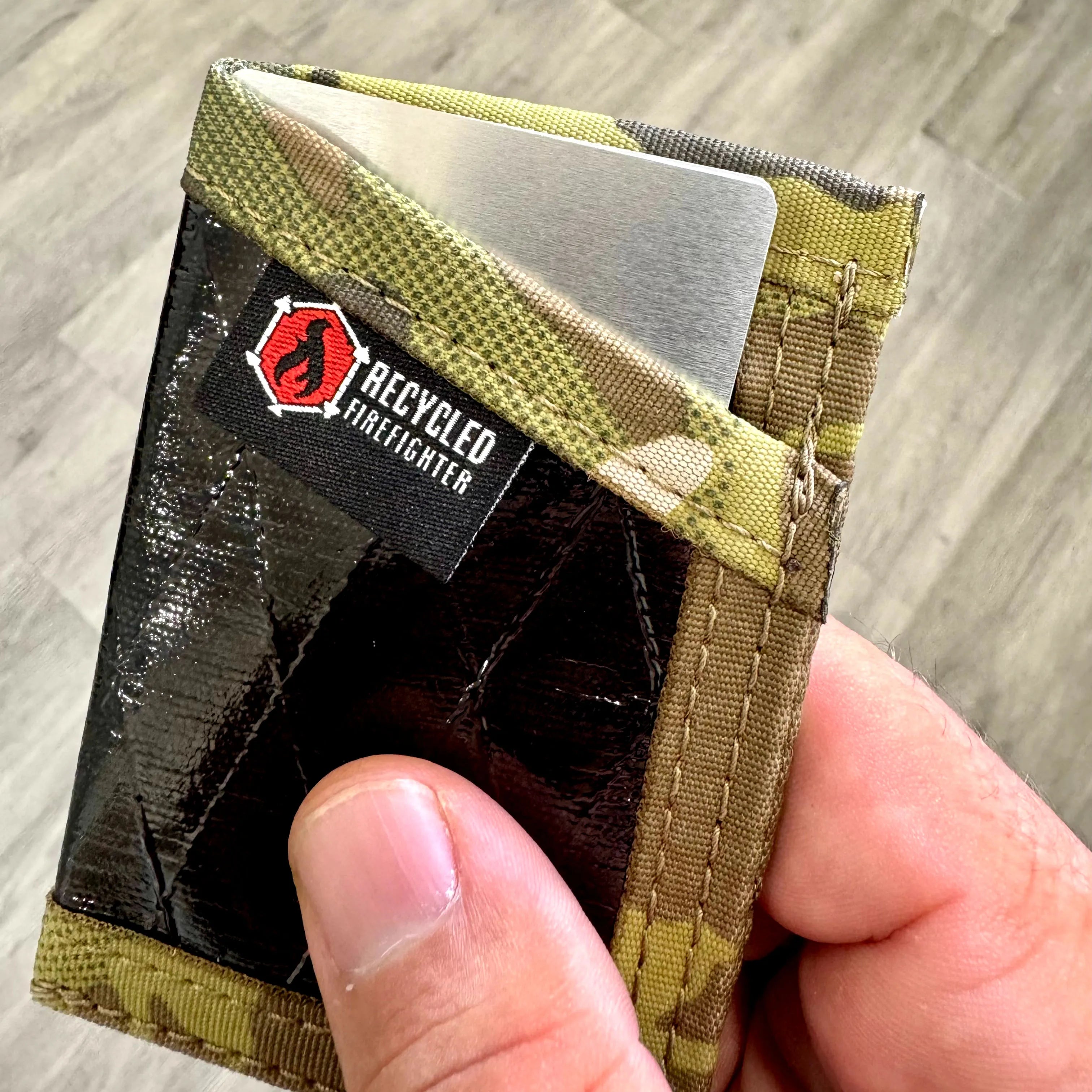 Two aluminum RFID blocker cards from Recycled Firefighter designed to protect against electronic theft.