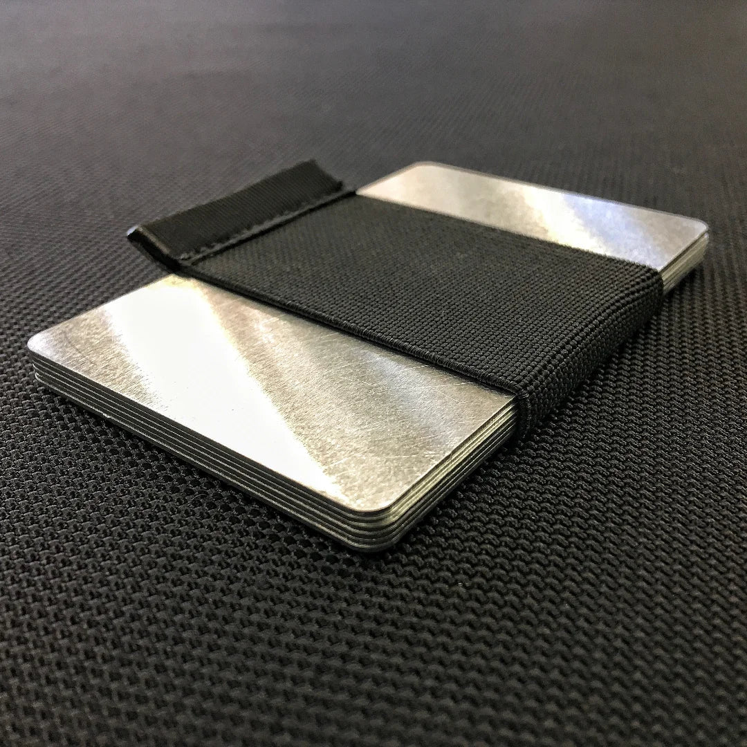 Two aluminum RFID blocker cards by Recycled Firefighter, designed to protect against electronic theft, shown in a 2-pack.