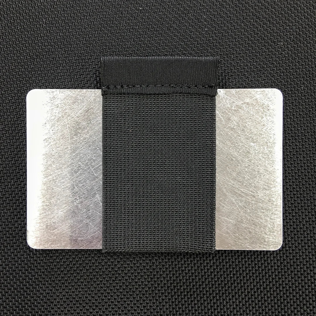 Two aluminum RFID blocker cards from Recycled Firefighter, designed to protect against electronic theft.