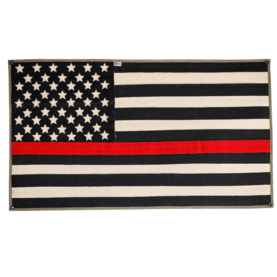 American flag made from recycled fire hose with thin red line, displayed on a white background, by Recycled Firefighter.