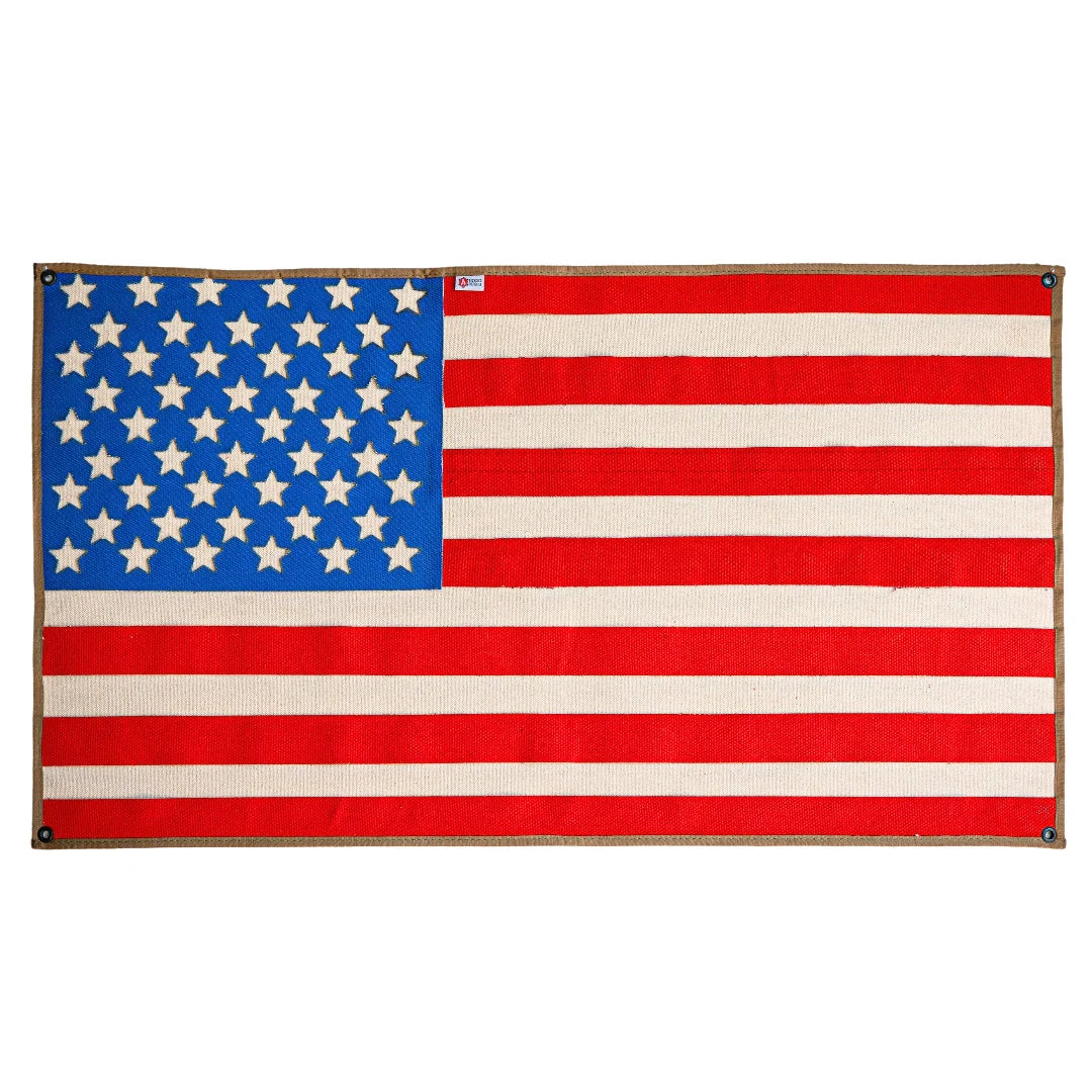 American flag made from fire hose by Recycled Firefighter, displayed on a white background.