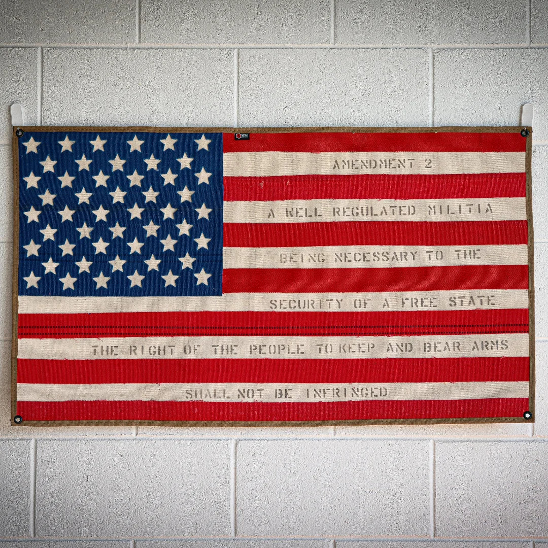 American flag made from recycled fire hose with Second Amendment text, by Recycled Firefighter, showcasing patriotic and eco-friendly design.
