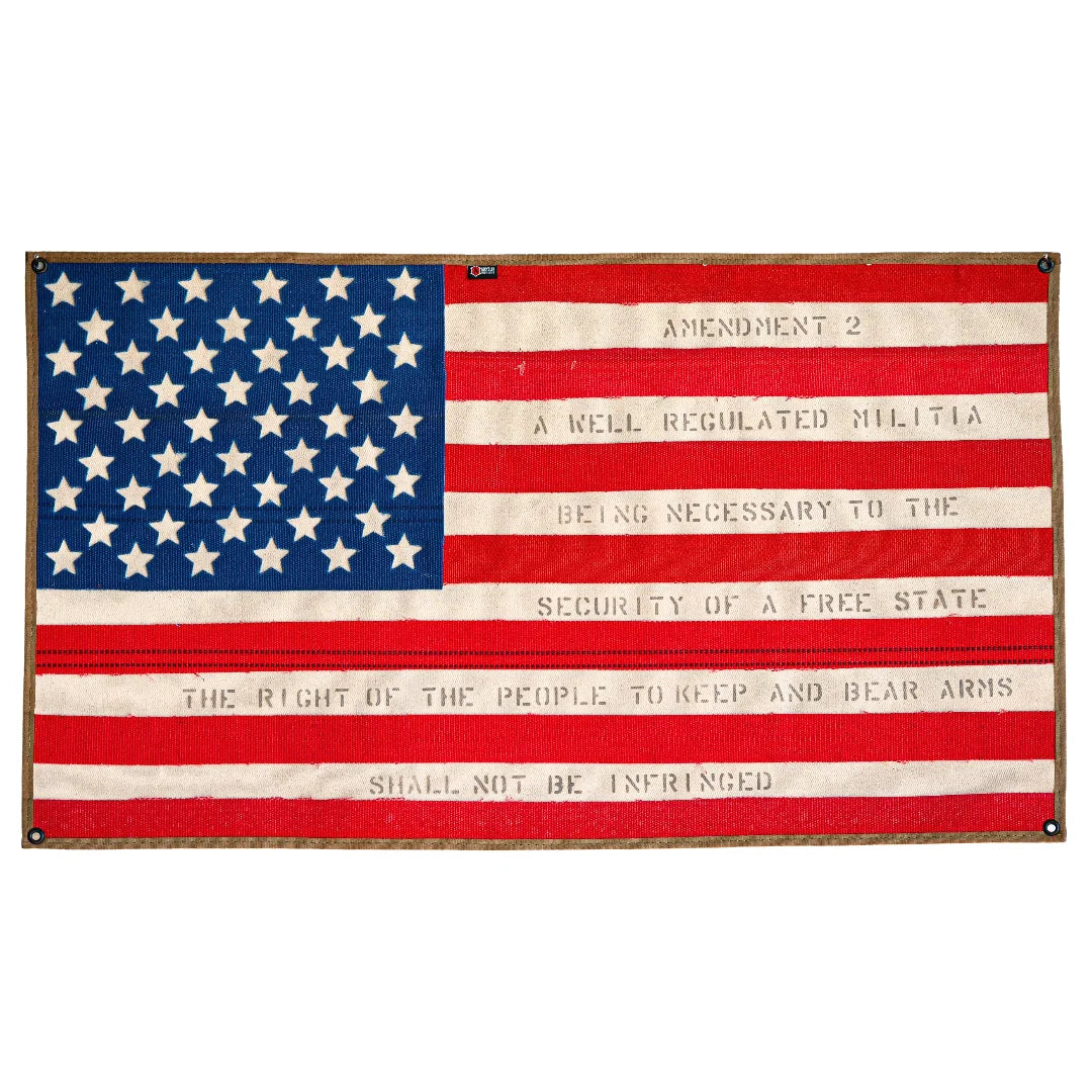 Recycled Firefighter American flag fire hose art with Second Amendment message, showcasing red, white, and blue flag design.