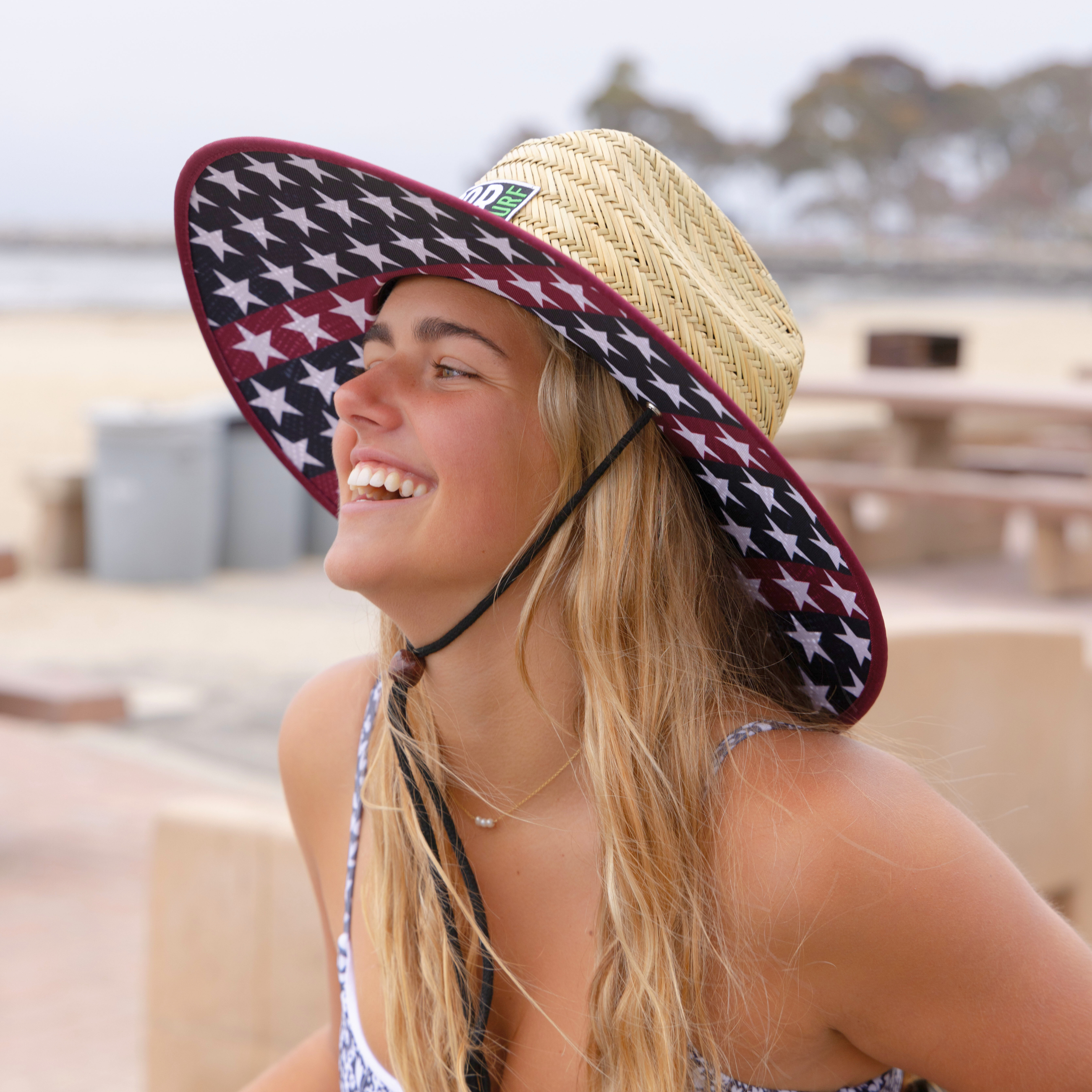 American flag straw lifeguard sun hat for adults by COR Surf, featuring patriotic design and wide brim for sun protection.
