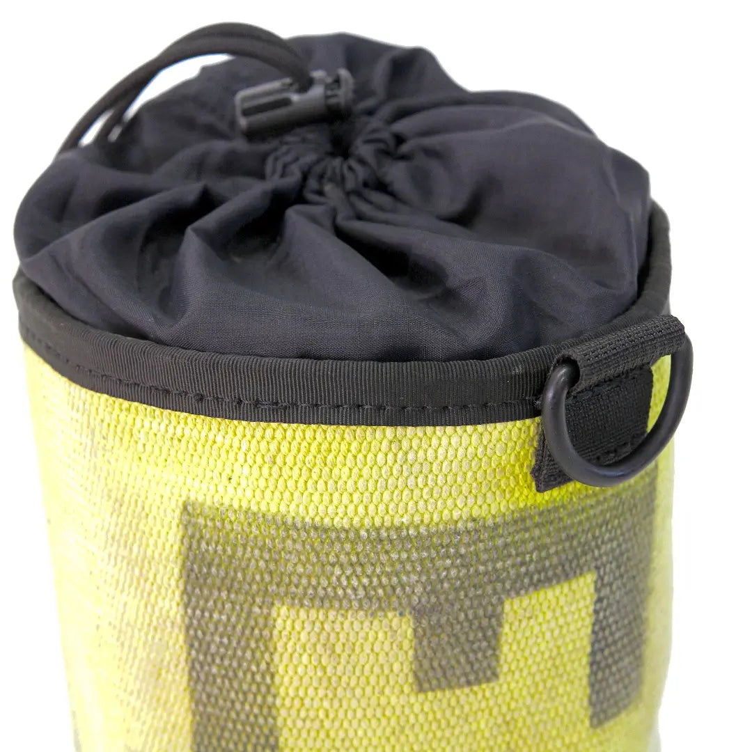 Recycled Firefighter ammo/gear bag with durable fabric, multiple pockets, and a sturdy handle for easy carrying.