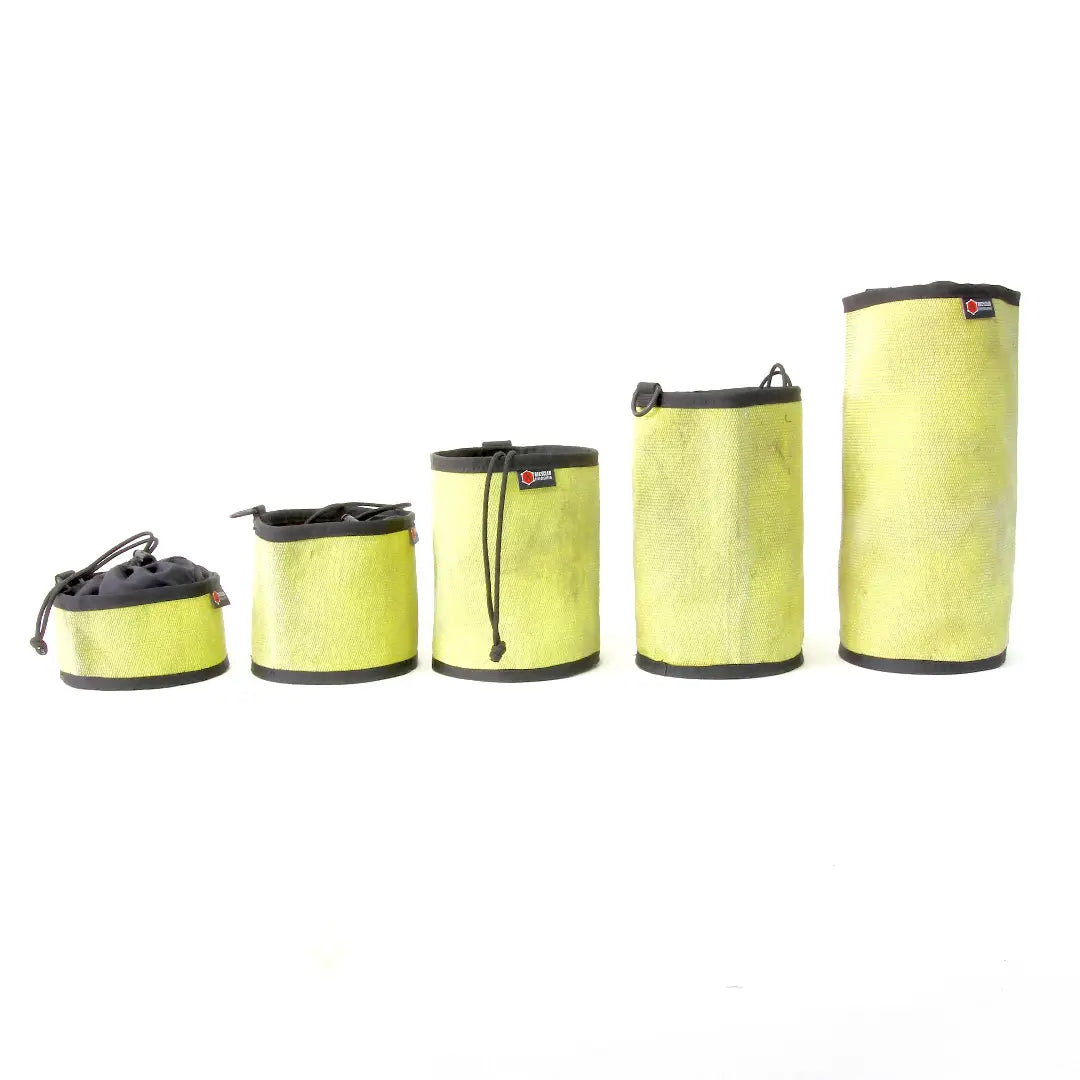 Recycled Firefighter ammo gear bag in a durable design, featuring multiple pockets and a rugged exterior for storage.