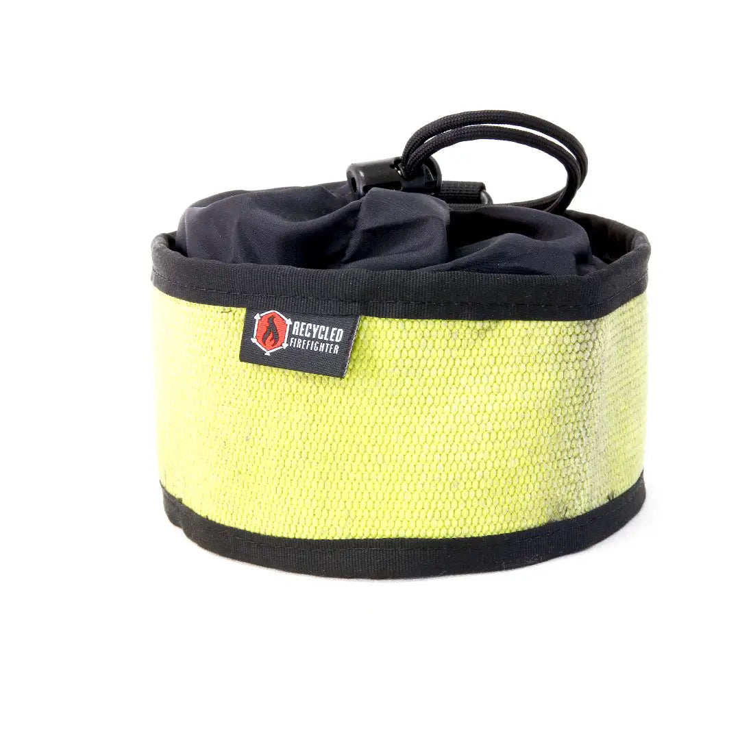 Yellow and black Recycled Firefighter ammo gear bag with sturdy handles and ample storage space for outdoor equipment.