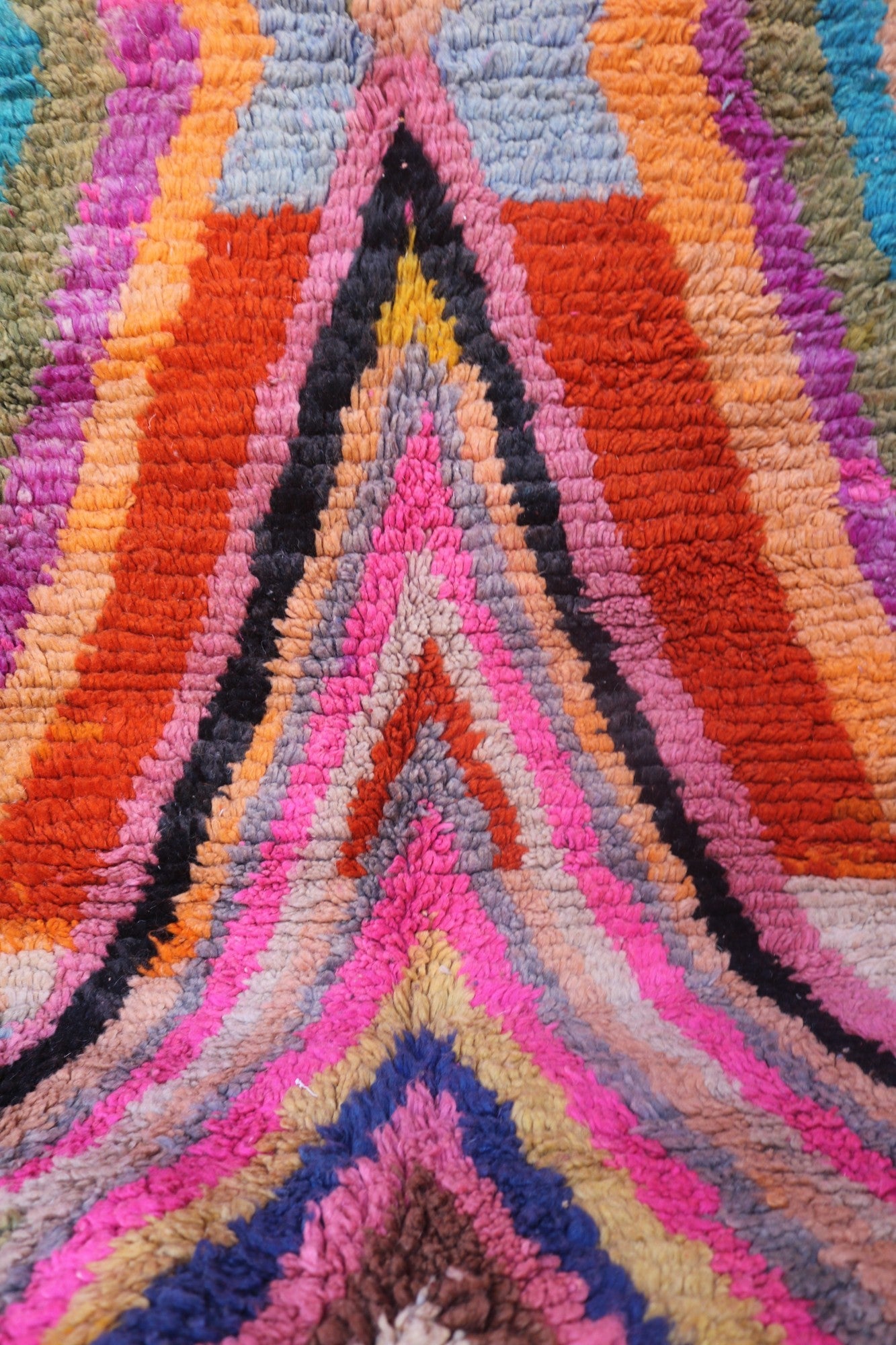 Handmade Moroccan wool Anir Berber rug by LoomSouk featuring intricate patterns and rich textures in warm tones.