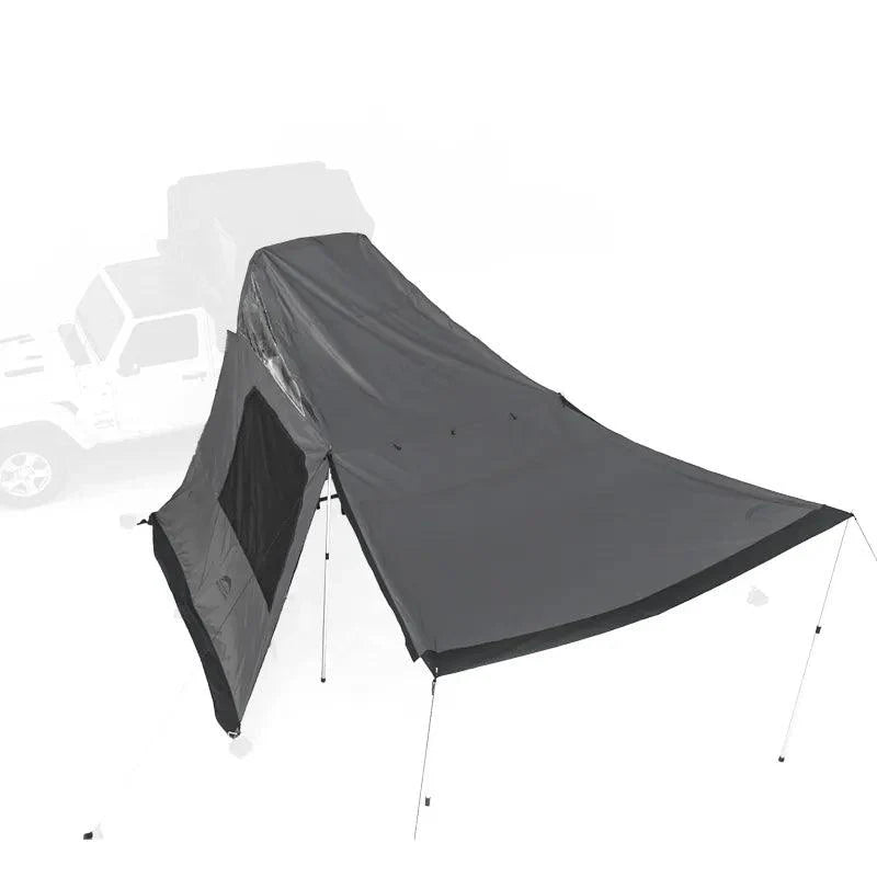 Wild Land Annex side car awning attached to OrthFrame Summit Explorer roof tent, showcasing overlanding gear and outdoor shelter setup.