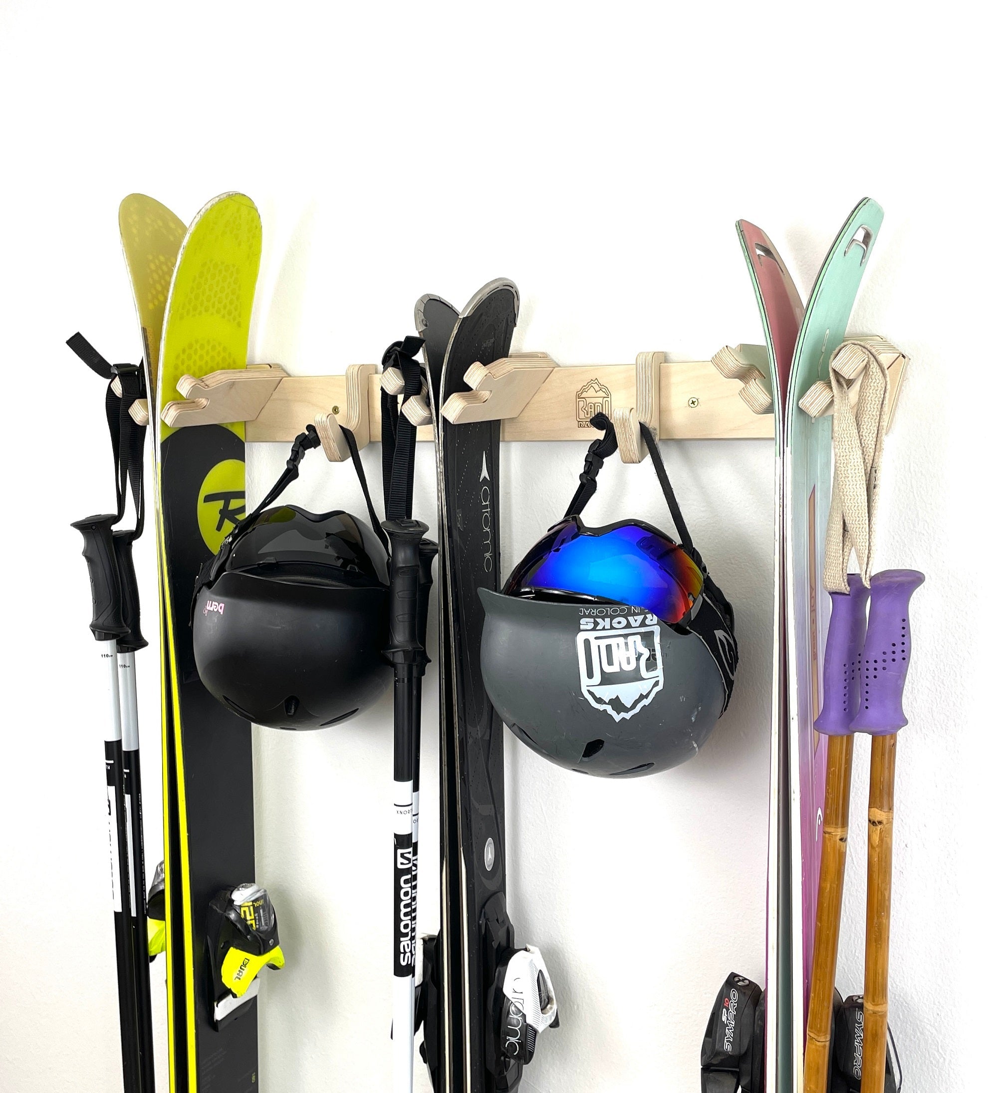 Rado Racks THE APRES ski wall rack holding skis in a modern indoor setting, designed for organized ski storage.