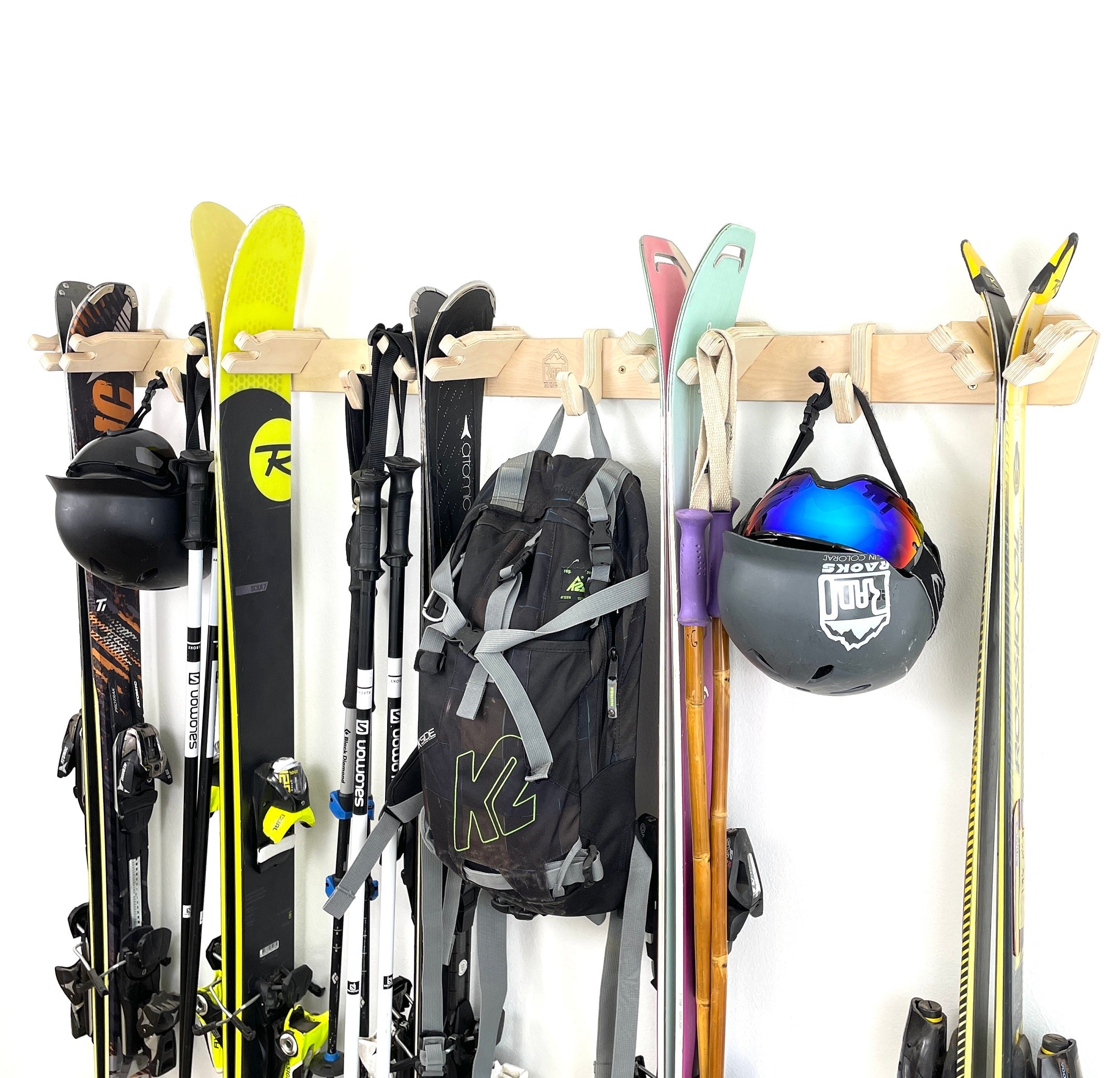 Rado Racks Après ski wall rack holding skis and poles, black metal ski storage rack mounted on wall.