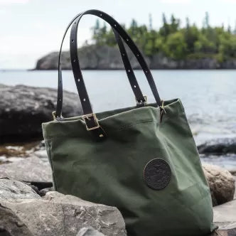 Backcountry Sportsman market tote with sturdy fabric handles and spacious main compartment for groceries or daily essentials.