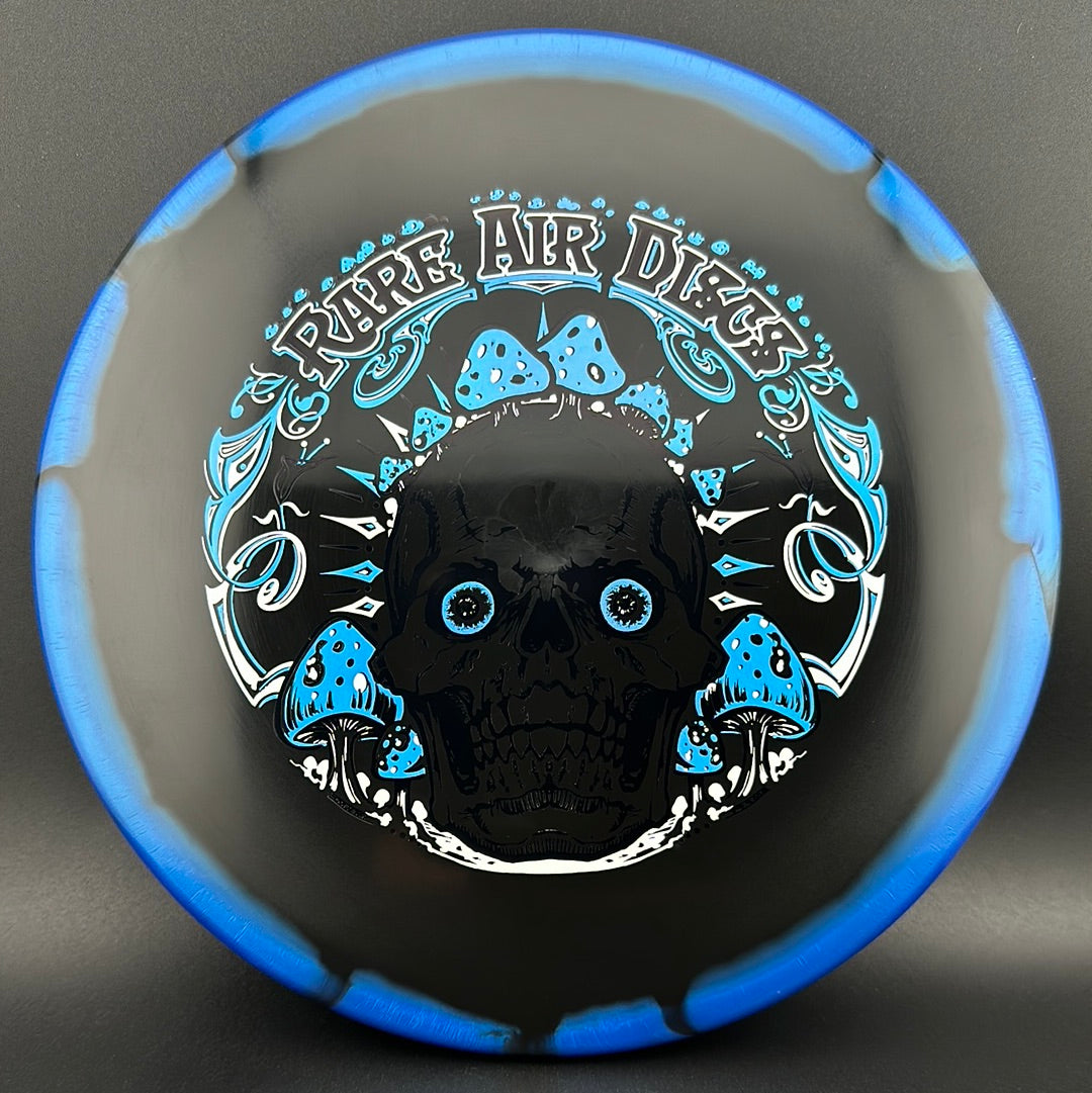 Disc golf disc from Rare Air Discs, Halo S-Blend Tomb Crushin' Amanitas stamp by Manny Trujillo, featuring vibrant mushroom artwork.