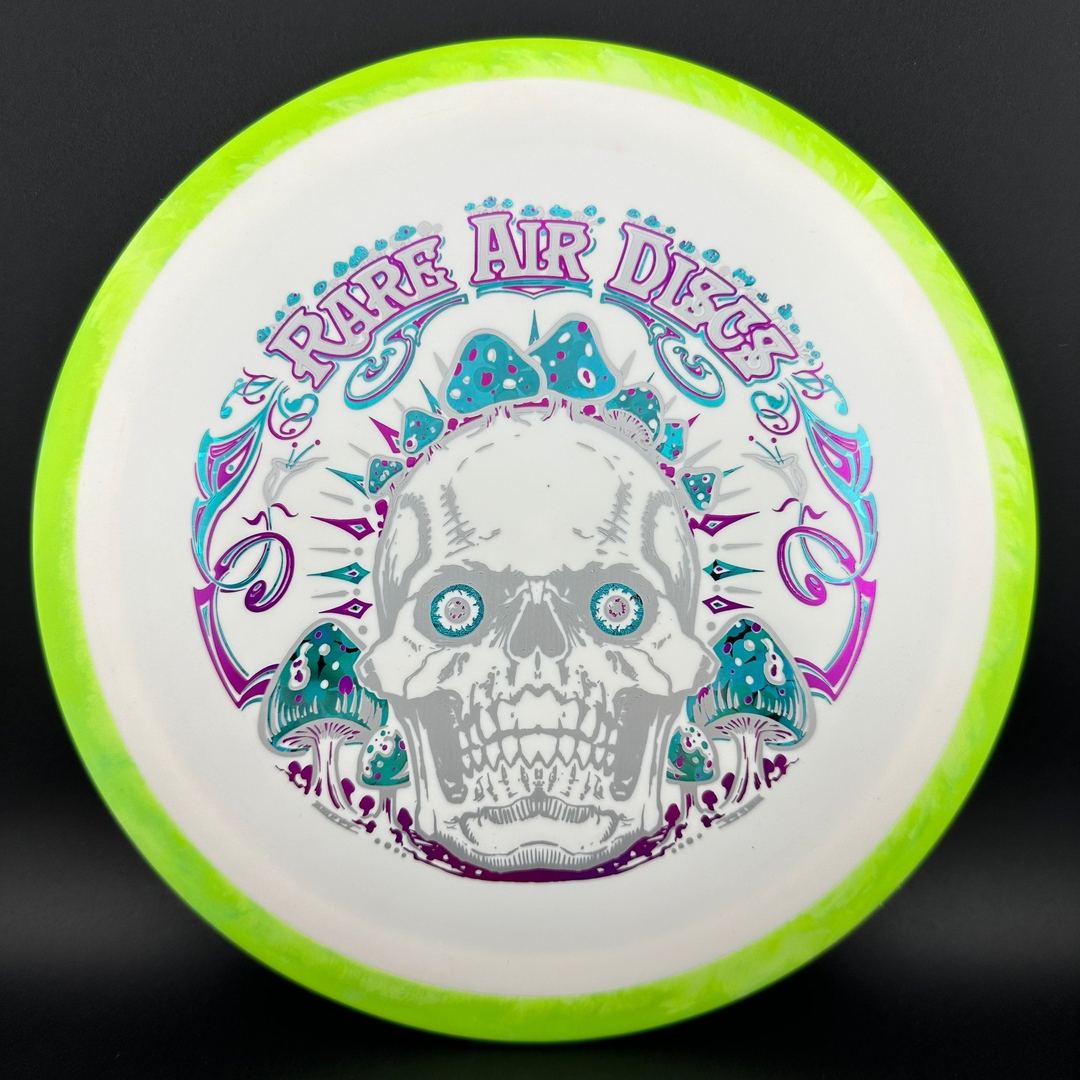 Rare Air Discs Fission Defy Crushin' Amanitas VIP 2.0 disc golf disc with colorful design and bold branding.