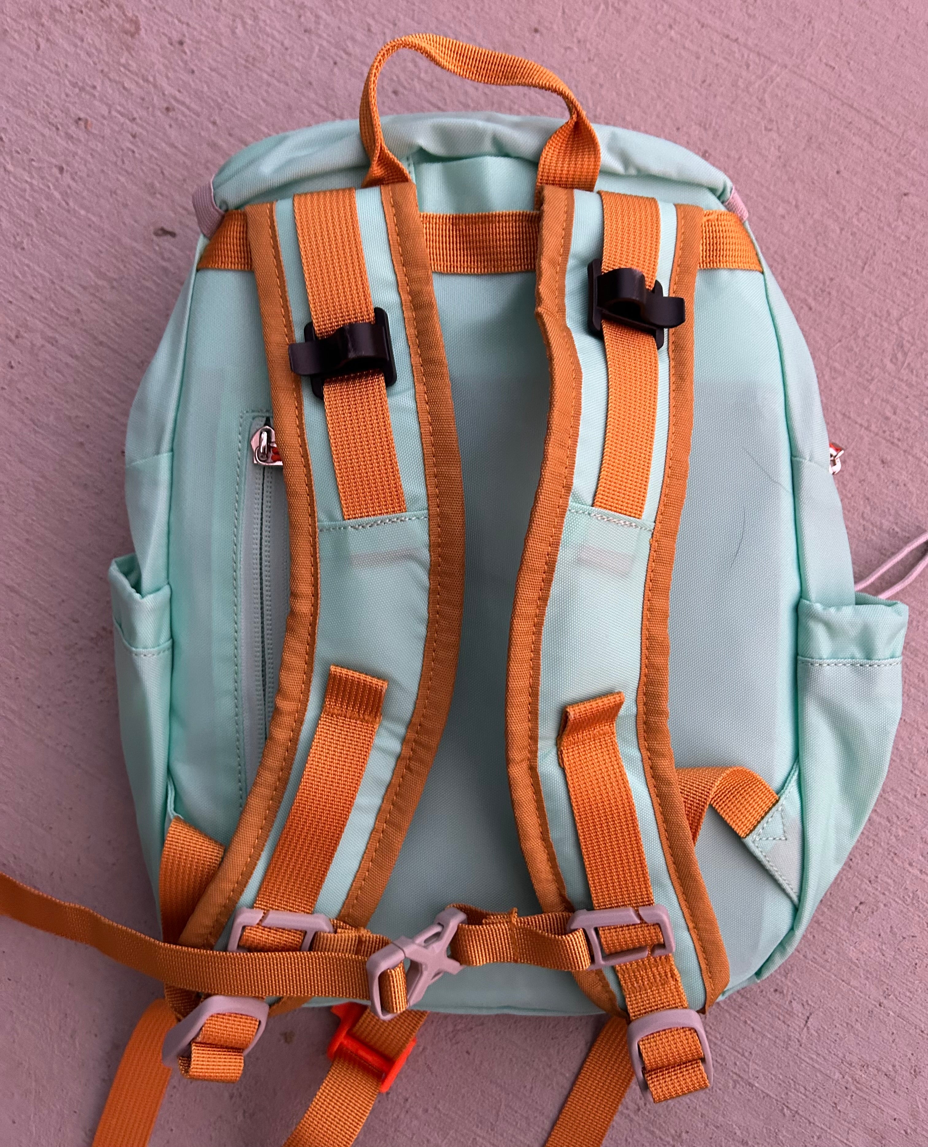 Light blue kids' hiking backpack by Keep the Littles Wild with water bladder system for children aged 2 to 7, suitable for young hikers.