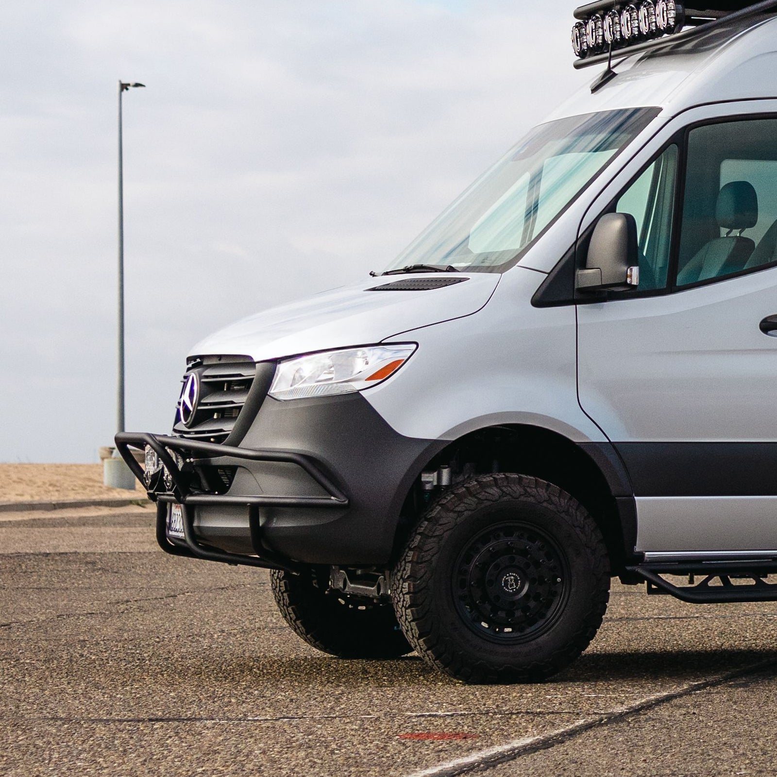 Sprinter Baja Bumper by The Van Mart, showcasing a durable exterior part designed for enhanced van protection.