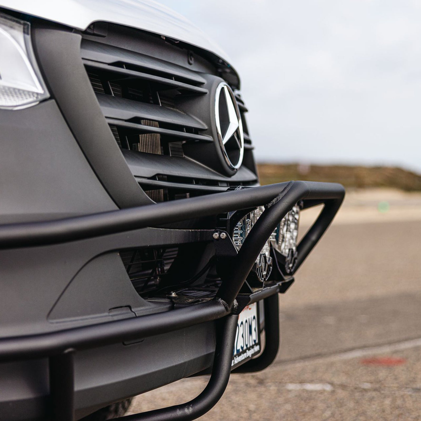 Sprinter Baja Bumper by The Van Mart, showcasing rugged design and durable construction for enhanced van protection.