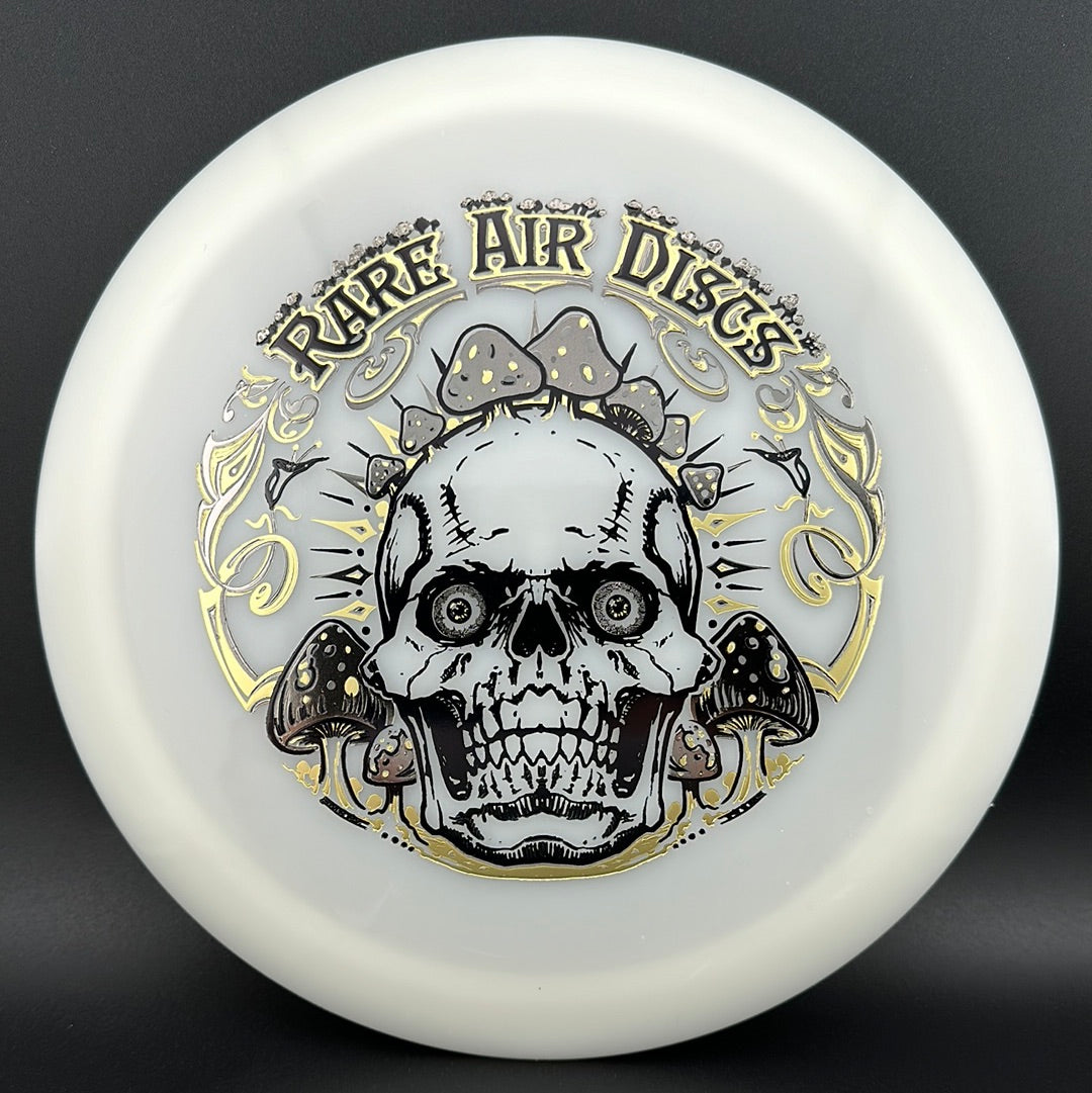 Forged Radiant Era Crushin' Amanitas disc golf stamp by Manny Trujillo on Rare Air Discs disc, featuring vibrant, detailed artwork.