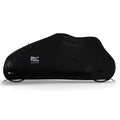 ZEITBIKE BikeParka cargo bicycle cover protecting a bike with waterproof fabric and adjustable straps.