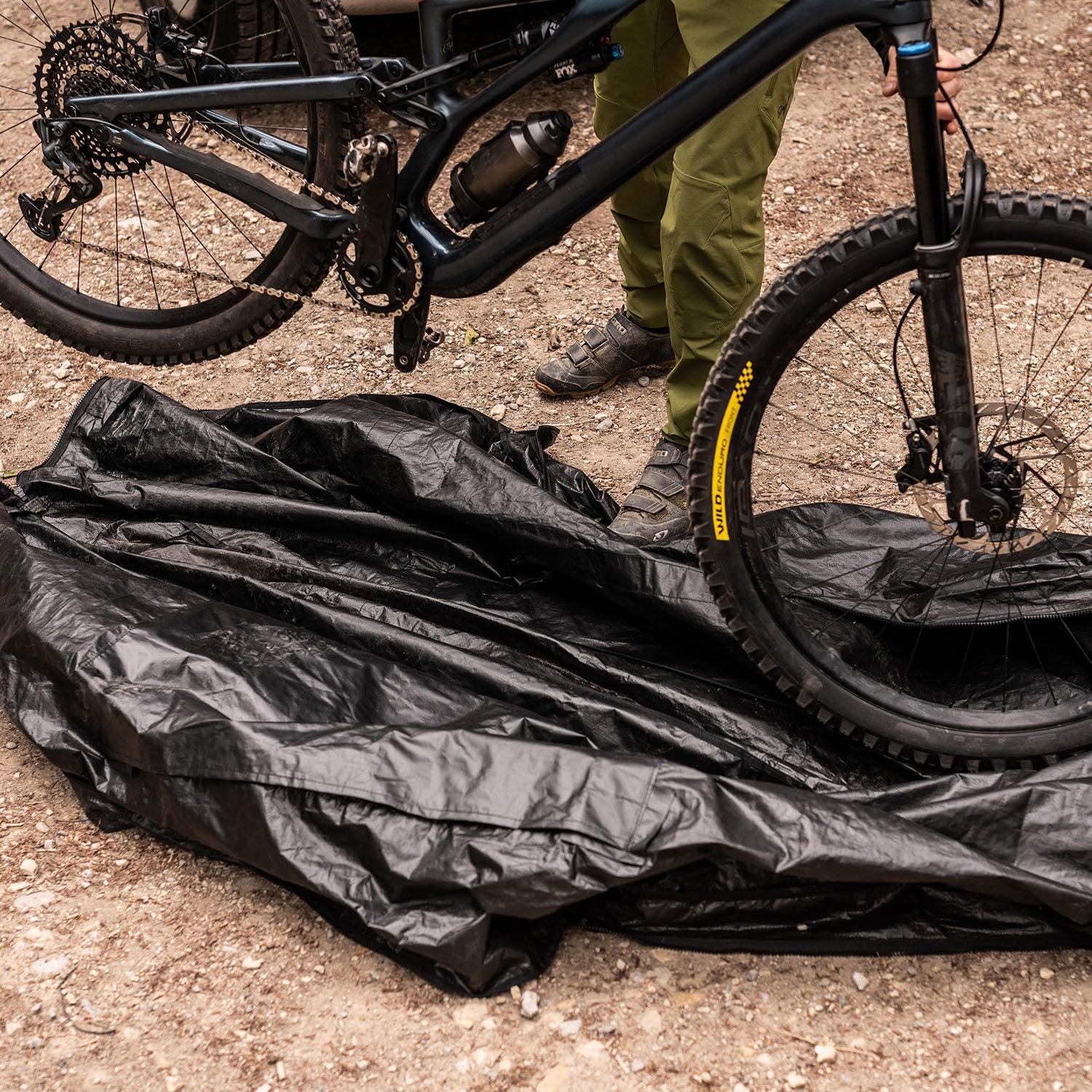 ZEITBIKE BikeParka RoughSac bicycle transport bag, durable black waterproof cover with straps for secure bike travel.