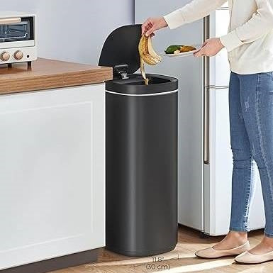 Black Motion Sensor Stainless Steel 13-gallon trash can with ozone button, sleek kitchen trash bin by HomePacific with automatic lid