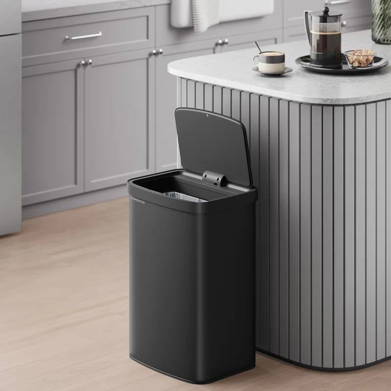 Black 13-gallon kitchen trash can with motion sensor lid and carbon filter by HomePacific, showing sleek design and sensor feature.